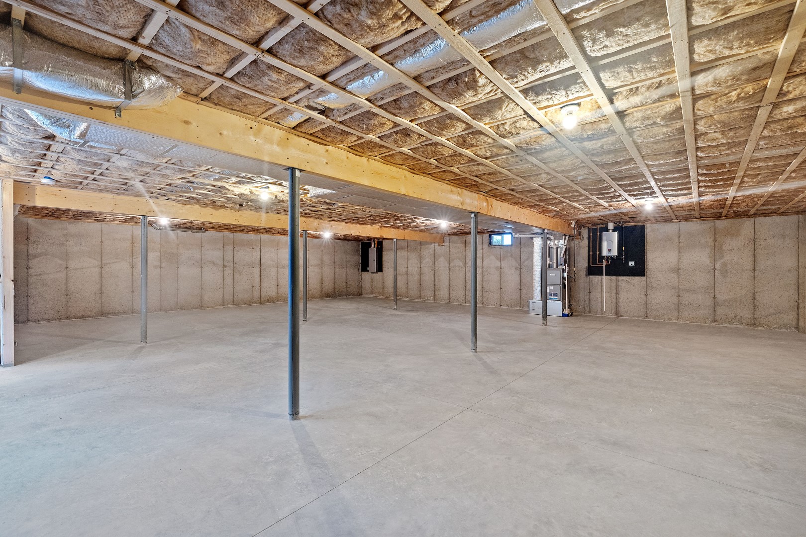 Newly built basement during a moisture test, a house before a renovation