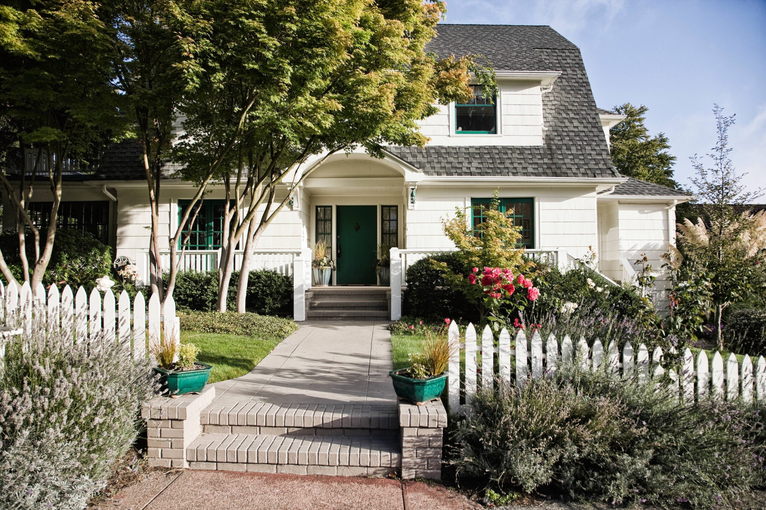 beautiful home with front yard garden